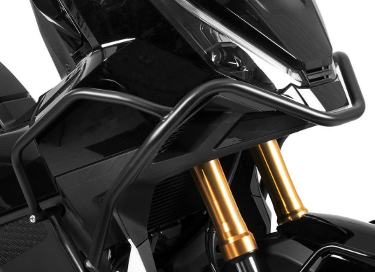 Close-up of a motorcycle's front suspension and headlight on a white background