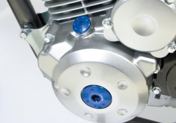 Close-up of mechanical components with blue and silver parts on a white background
