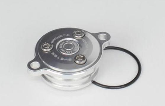 Metallic mechanical component on a gray background