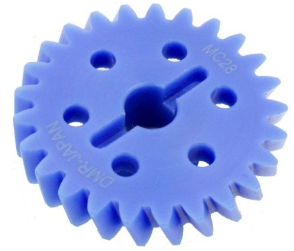 Blue plastic gear with a central shaft on a white background