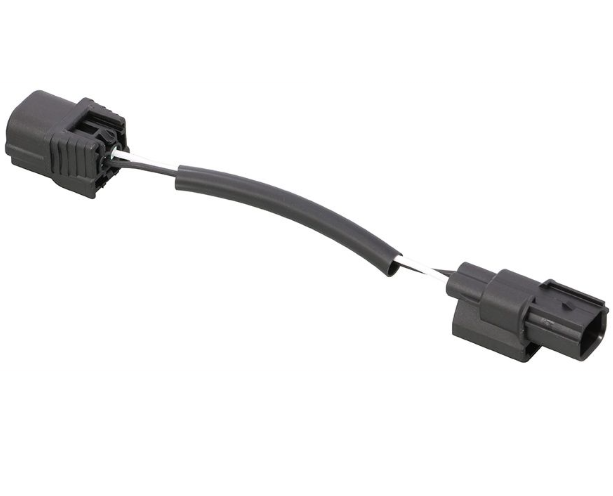 Car wiring connector with a flexible cable on a white background