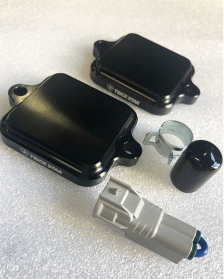 Set of black and gray automotive parts on a white background