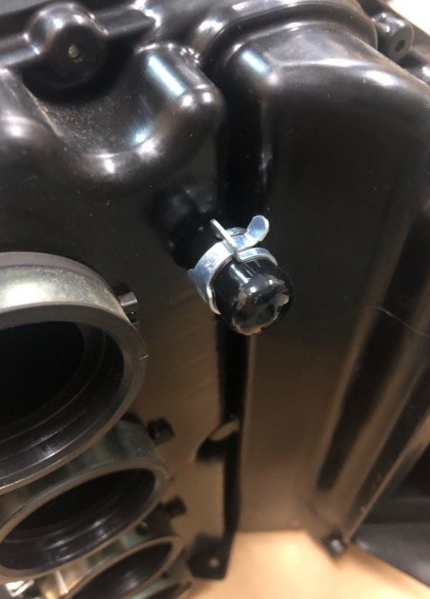 Close-up of a mechanical component with a screw