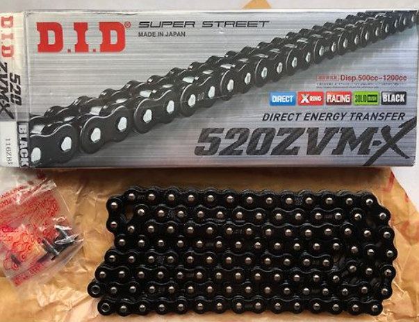 D.I.D chain with packaging on a wooden surface