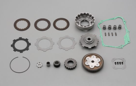 Collection of mechanical gears and components on a gray background