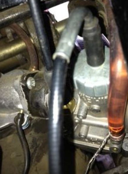 Close-up of mechanical components with visible rust and wear