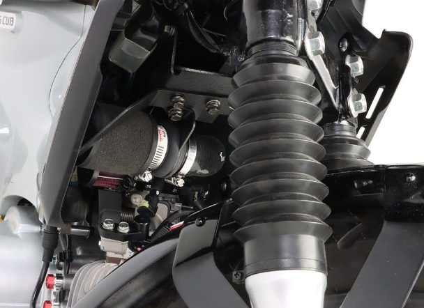 Close-up of a motorcycle suspension system with a white background