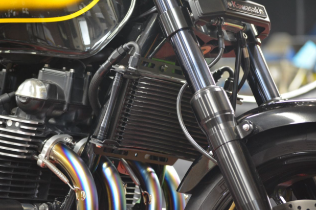 Close-up of a motorcycle engine with visible branding