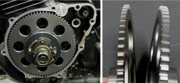 Close-up of mechanical gears and a gear pair on a dark background