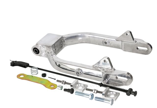 Motorcycle rear suspension components on a white background