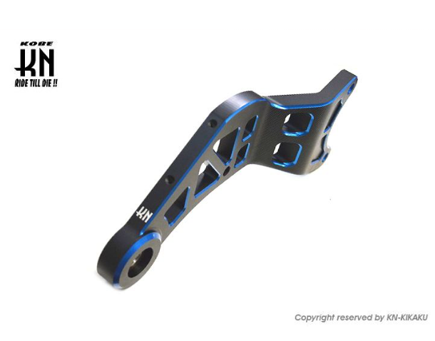 Metal component with blue accents on a white background, featuring the KORBE logo.