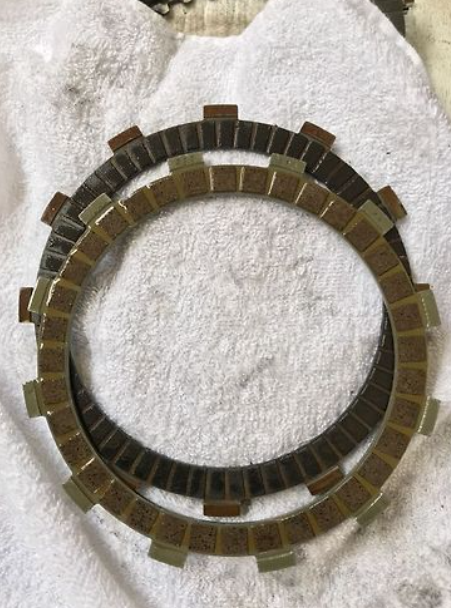 Clutch plate on a white towel