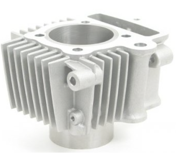 Metallic engine cylinder head on a white background