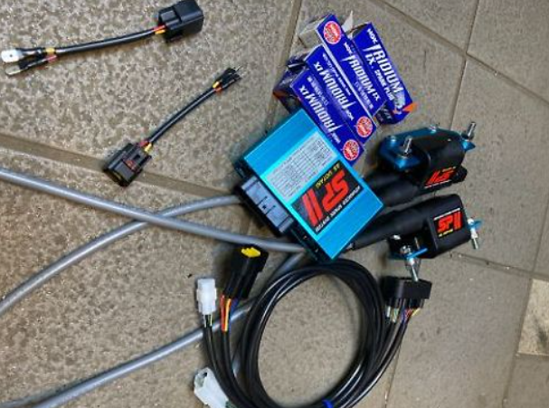 Electrical components including wires and connectors on a tiled floor