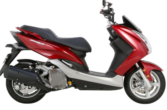Red and black scooter on a white background