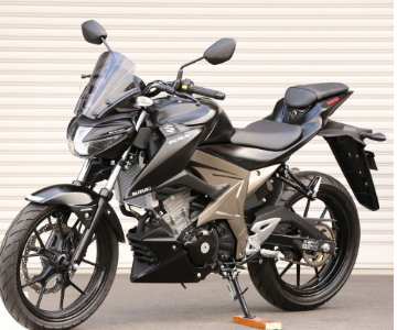 Black and silver motorcycle on a white background