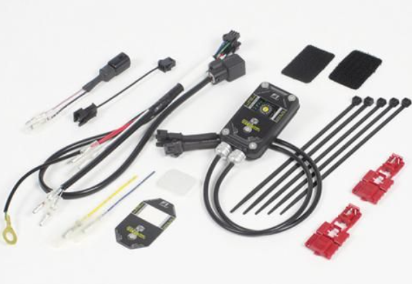 Automotive wiring harness kit with connectors and cables on a white background