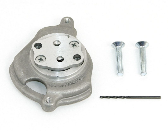 Metal mechanical component with screws and a drill bit on a white background