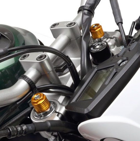 Close-up of motorcycle suspension and components on a white background