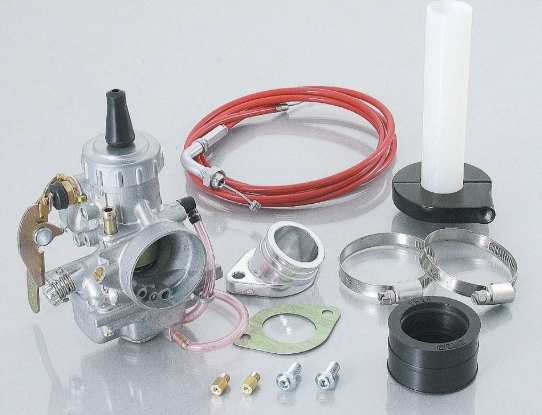 Carburetor and related parts on a reflective surface