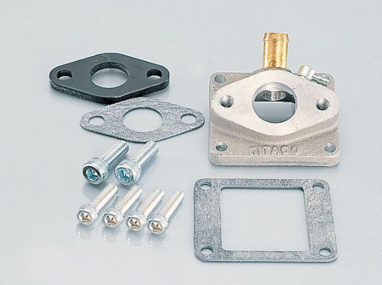 Carburetor kit with parts on a gray background