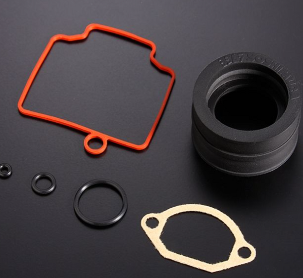 Set of gaskets and seals on a black background