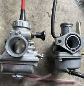 Two mechanical components on a concrete surface