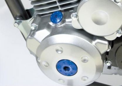 Close-up of mechanical components with blue and silver parts on a white background