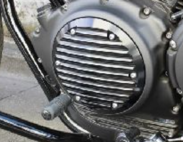 Close-up of a motorcycle engine with a metallic finish.