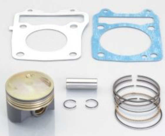 Engine piston and rings set on a white background