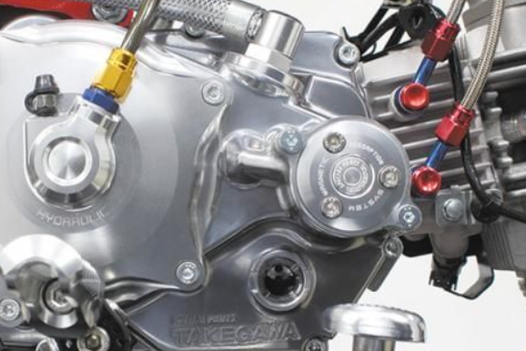 Close-up of a motorcycle engine with visible branding
