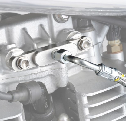 Close-up of a mechanical component with a tool being used on it