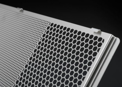 Metallic honeycomb panel on a black background