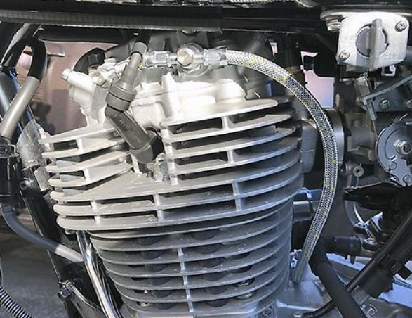 Close-up of a motorcycle engine with visible components