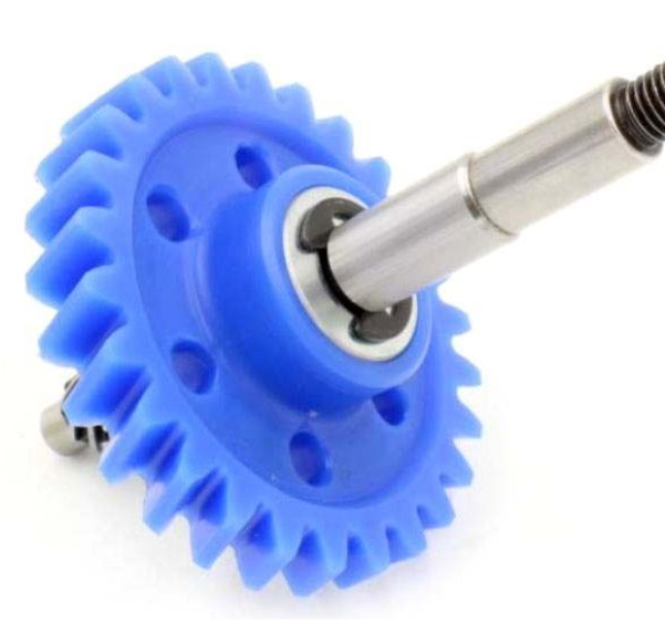 Blue gear with metal shaft on a white background