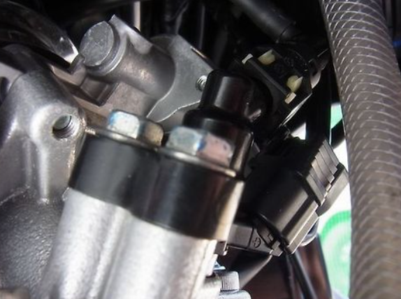Close-up of mechanical components with a focus on metal parts and bolts.