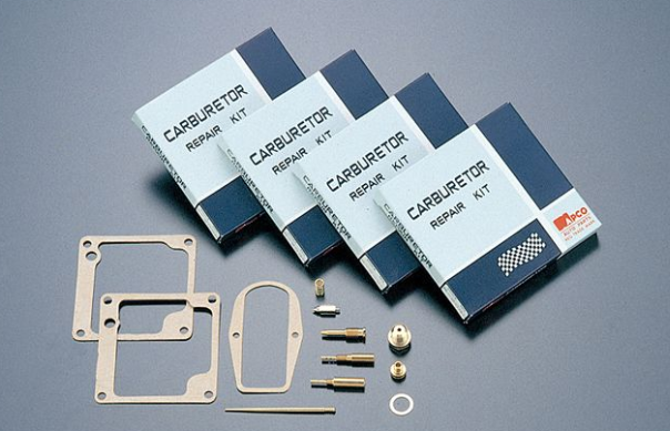 Carburetor repair kit with packaging on a gray background
