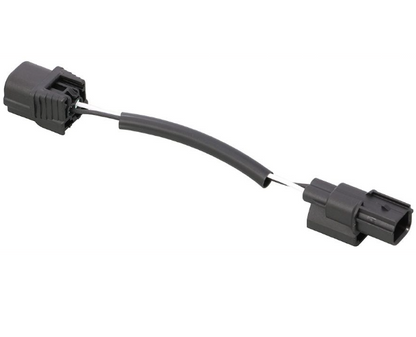 Car wiring connector with a flexible cable on a white background