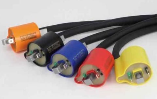 Set of colored electrical connectors on a white background