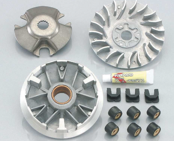 Mechanical components including gears and bearings on a gray background
