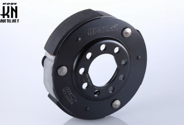 Black clutch plate with Koso branding on a white background