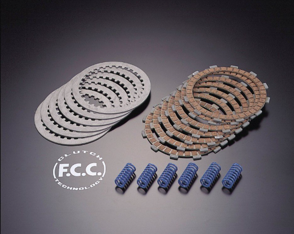 Clutch components including plates and springs on a dark background with F.C.C. branding.