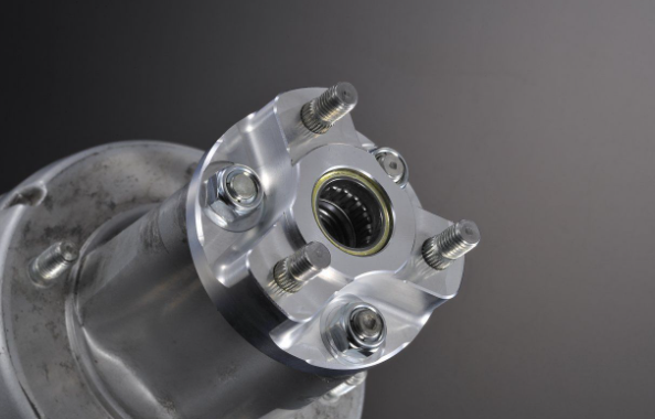 Close-up of a metallic mechanical component on a dark background