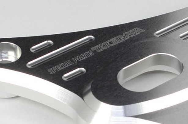 Metallic component with 'Vazegen' branding on a gray background