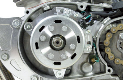 Close-up of a mechanical component with gears and metal parts.