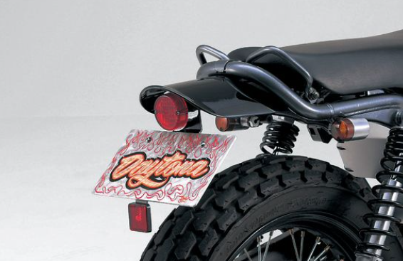 Close-up of a motorcycle's rear with a visible brand logo on a white background
