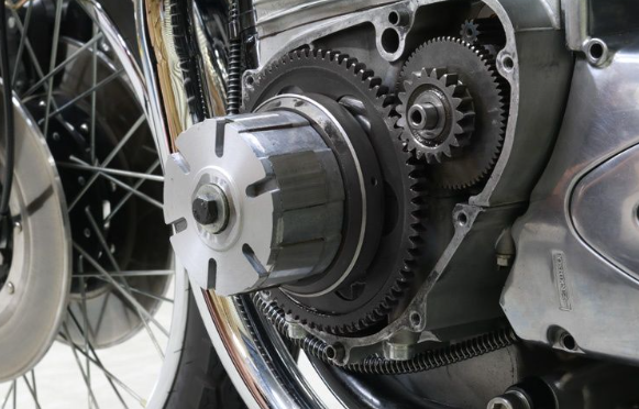 Close-up of motorcycle gears and wheel assembly