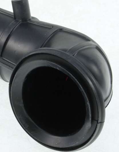 Close-up of a black plastic pipe fitting on a white background