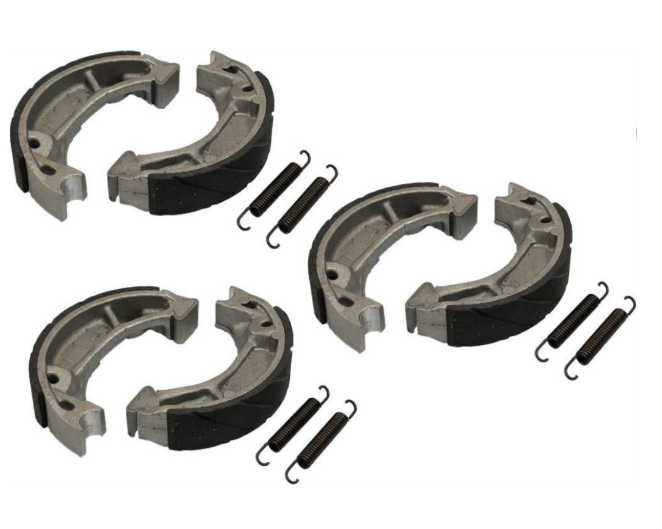 Set of brake shoes and springs on a white background