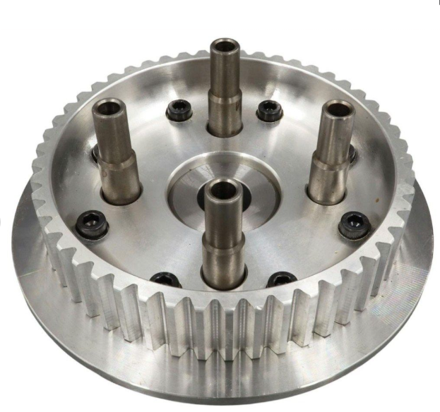 Metal gear component with cylindrical protrusions on a white background